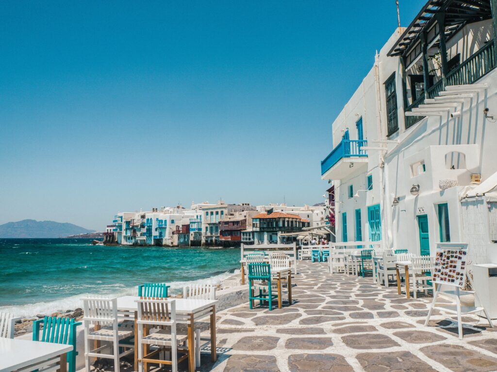 View of Mykonos Town, and restaurants  by the Aegean Sea